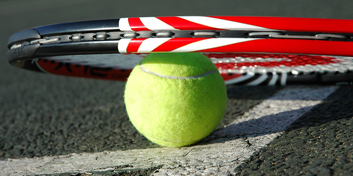 Tennis racquet with ball
