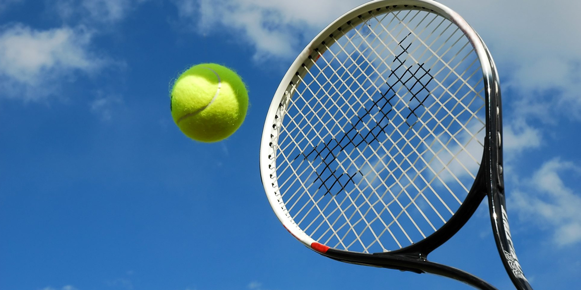 Tennis racquet with ball