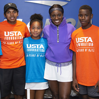 August 24, 2019 - Sloane Stephens poses with USTA Foundation kids at Arthur Ashe Kids' Day at the 2019 US Open. (Photo by Jennifer Pottheiser/USTA)