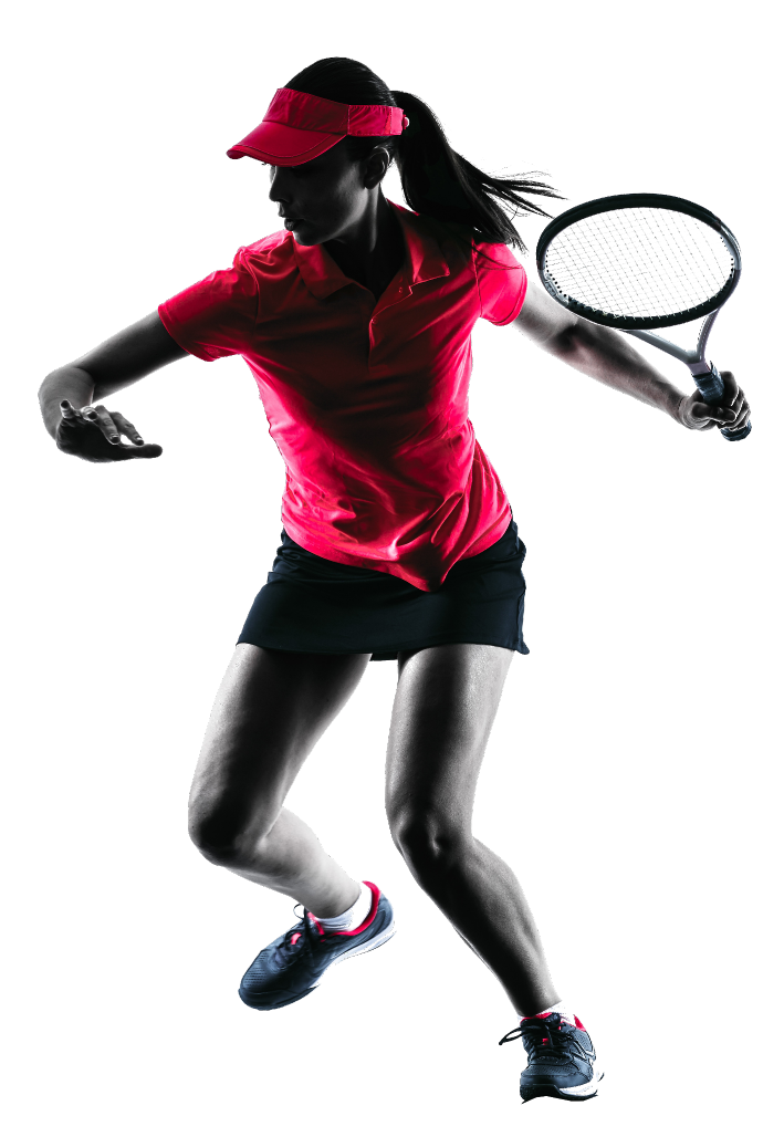 Silhouette of Female adult tennis player wearing a bright pin shirt swinging a tennis racquet.
