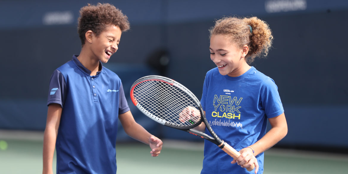 Players laugh during a match at USTA Eastern's New York Clash event.