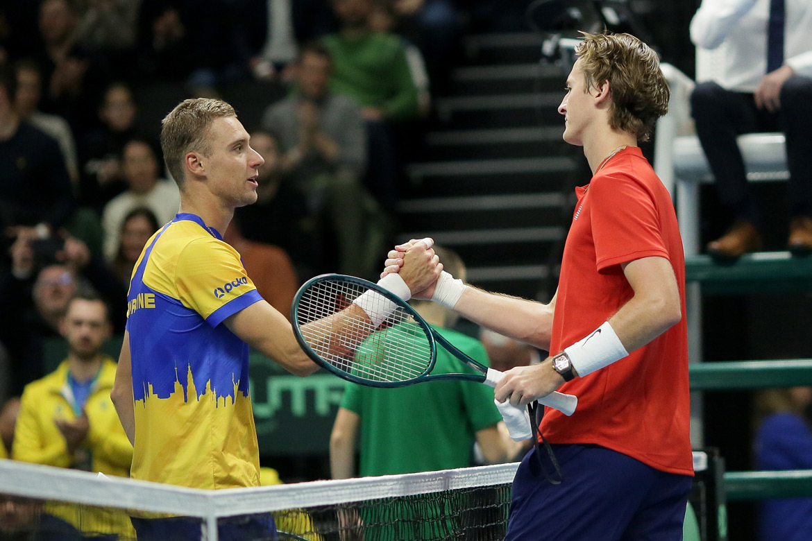 Sebastian Korda shakes hands with Oleksii Krutykh at Davis Cup. Photo by Tim Ireland/Getty Images for ITF.