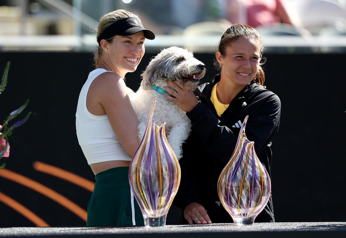 Champion Danielle Collins, her dog Quincy and runner-up Daria Kasatkina in Charleston. Photo by Elsa/Getty Images.