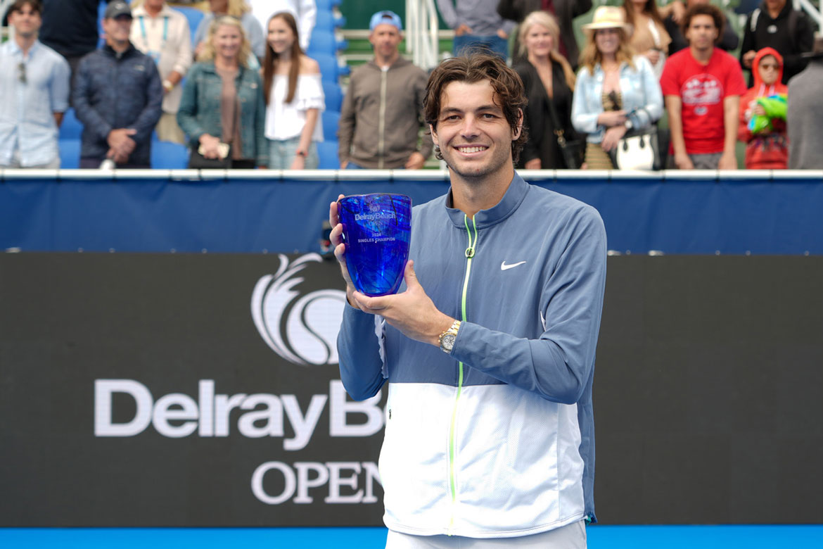 Taylor Fritz lifts the 2024 Delray Beach Open men's singles title. Photo by Andrew Patron/Delray Beach Open.