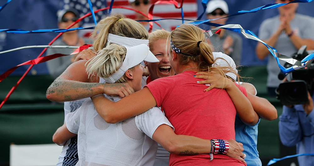 USA team members celebrate winning their FedCup matches against the Czech Republic at the Saddlebrook Resort on April 23, 2017 in Tampa Bay, Florida. Photo by Gary Hershorn