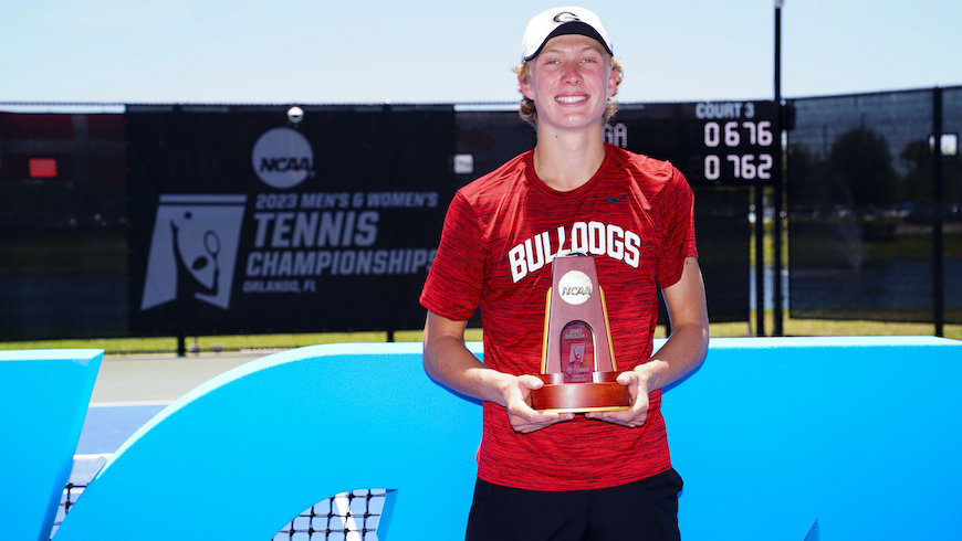 Ethan Quinn of The University of Georgia poses for a photo with the singles champion trophy after winning the 2023 NCAA Division I Men’s Tennis Championship Singles Finals at the USTA National Campus in Orlando, Florida on Saturday, May 27, 2023. (Photo by Manuela Davies/USTA)