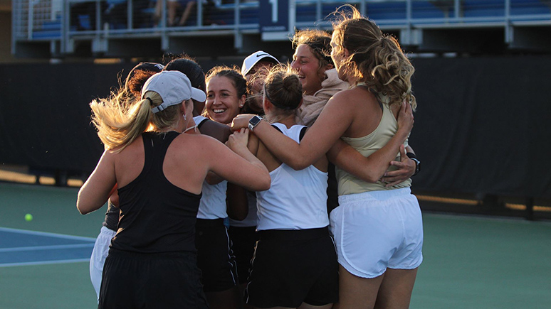 The UCF women celebrate their place in the NCAA Round of 16 after a win over Miami. Photo courtesy of UCF Athletics.