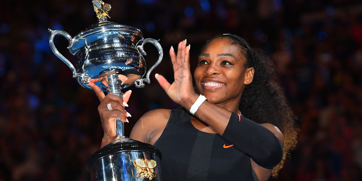 Serena Williams poses with her trophy after winning her record 23rd Grand Slam singles title at the 2017 Australian Open.