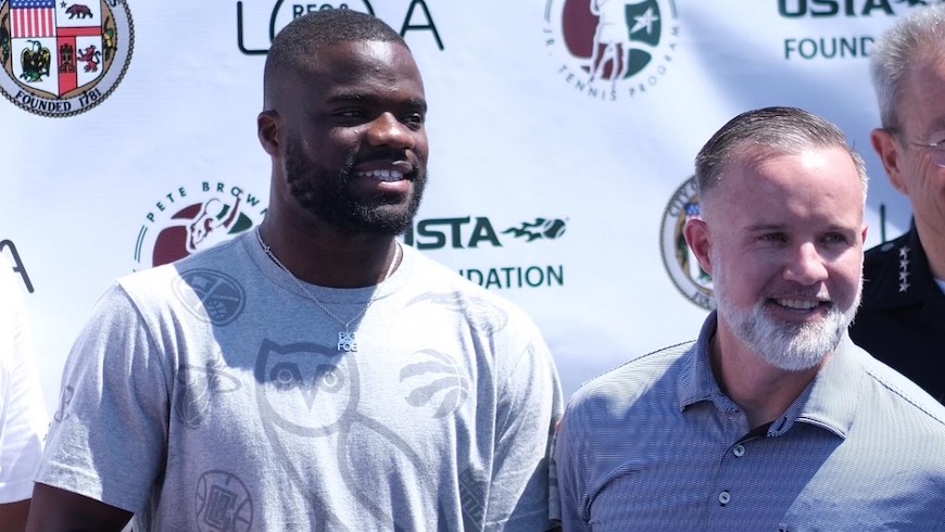 Frances Tiafoe and Robert Howland of the USTA Foundation.
